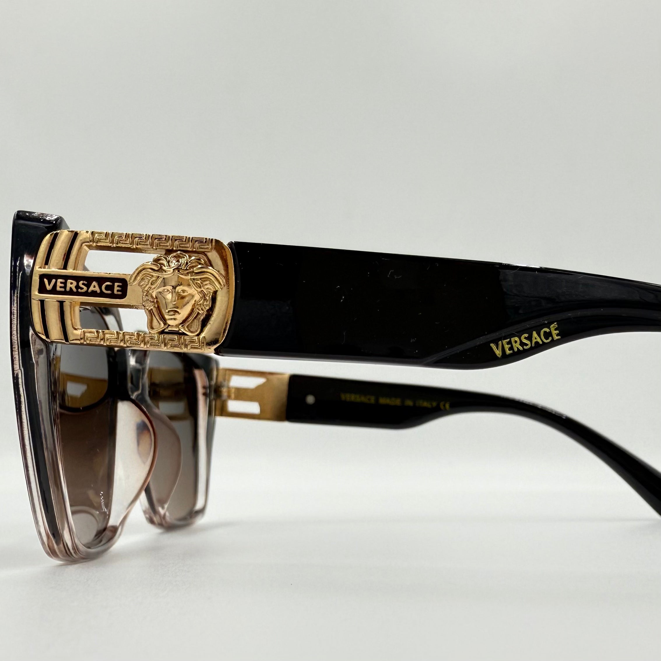 Versace M94152 Rectangular Sunglasses β Transparent Brown Frame, Medusa Detail