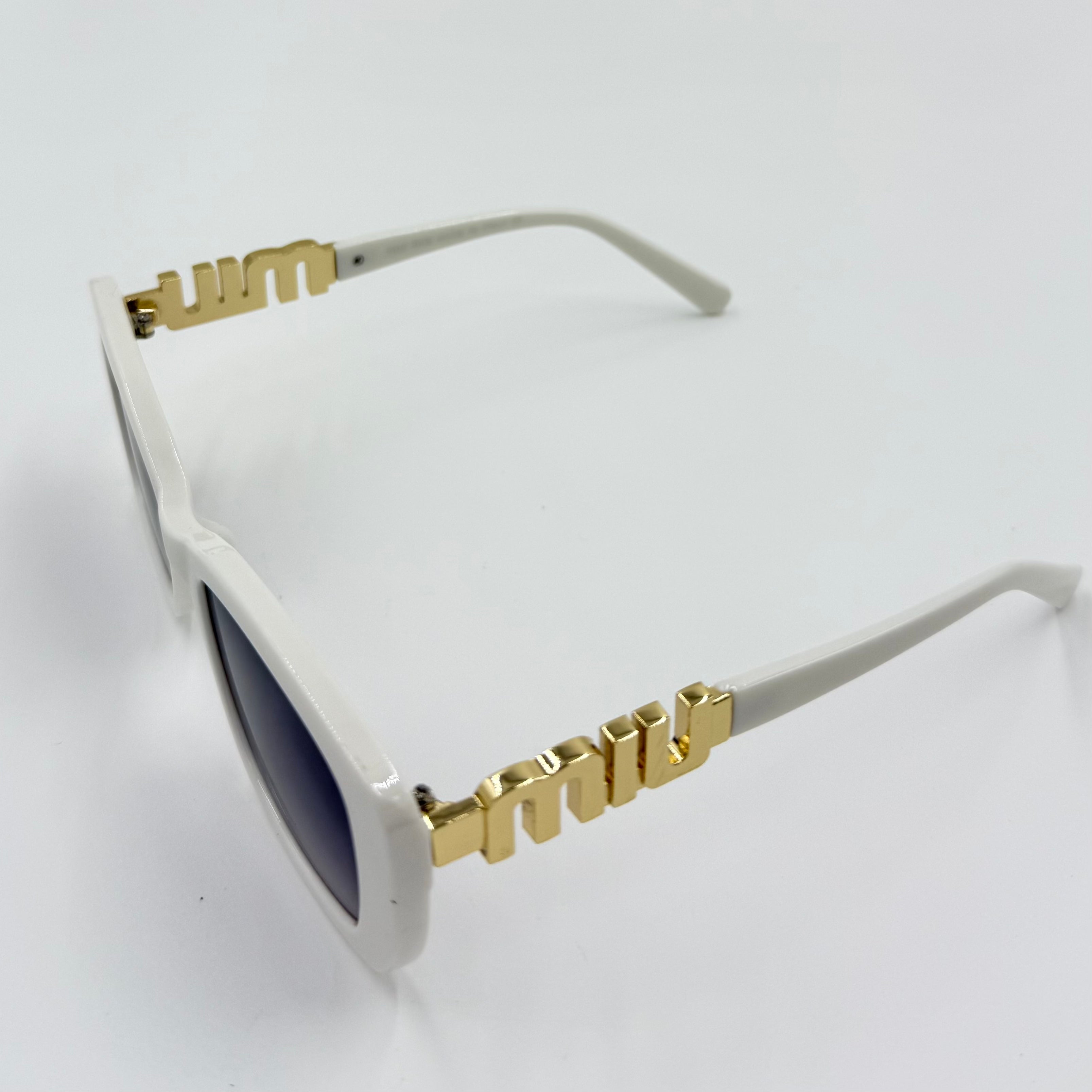 Miu Miu 26321 Sunglasses β White & Black Frames with Dark Grey or Black Lenses