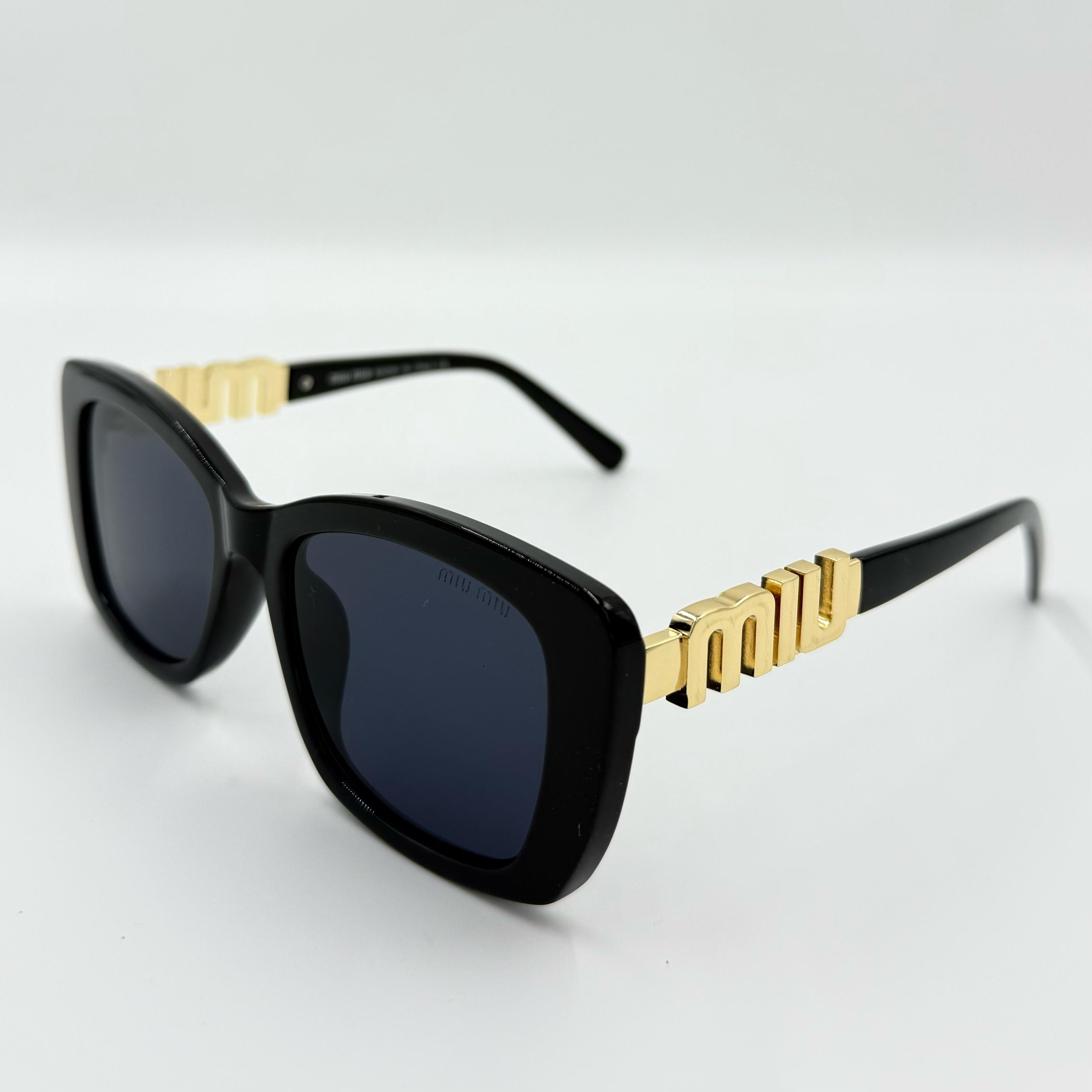 Miu Miu 26321 Sunglasses β White & Black Frames with Dark Grey or Black Lenses