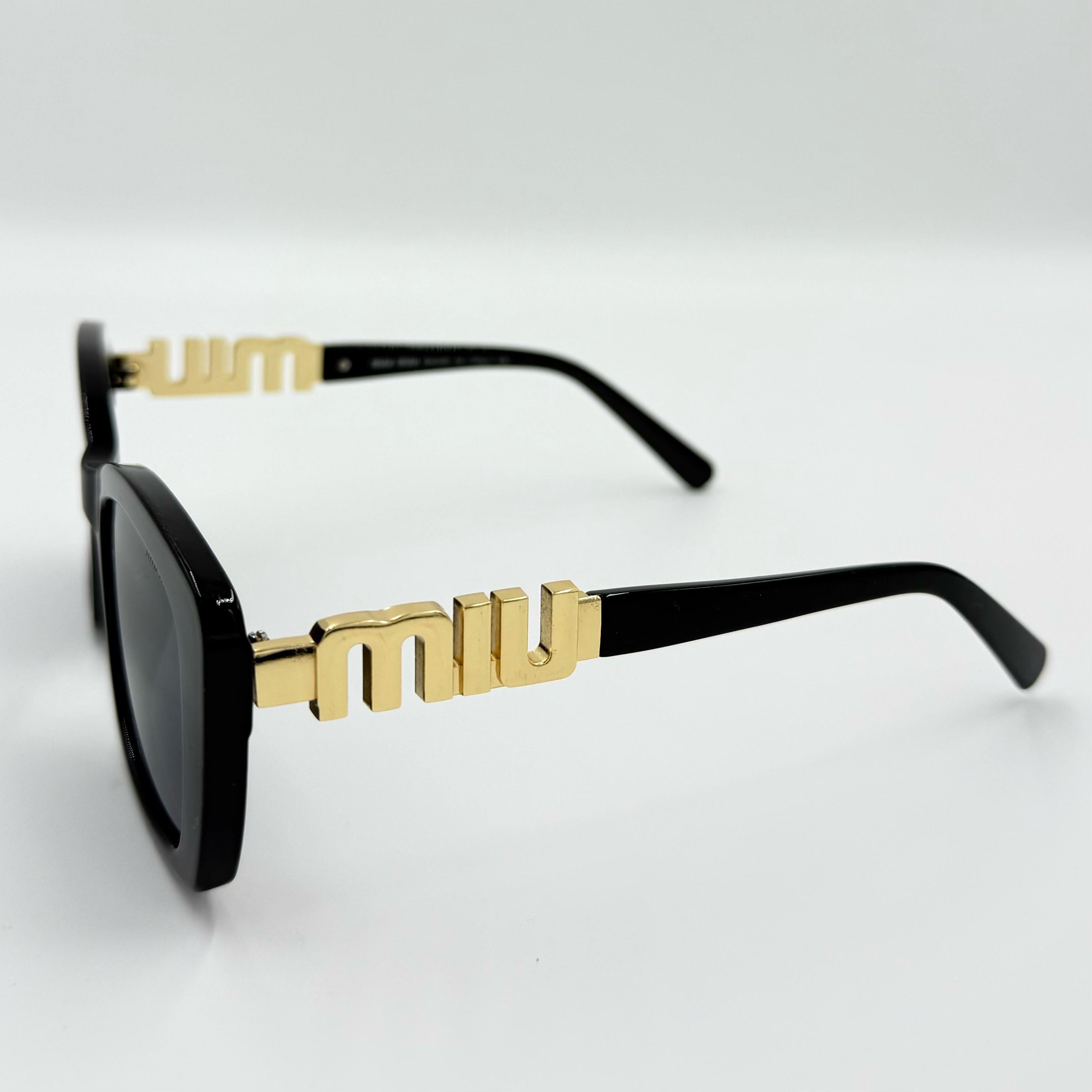 Miu Miu 26321 Sunglasses β White & Black Frames with Dark Grey or Black Lenses