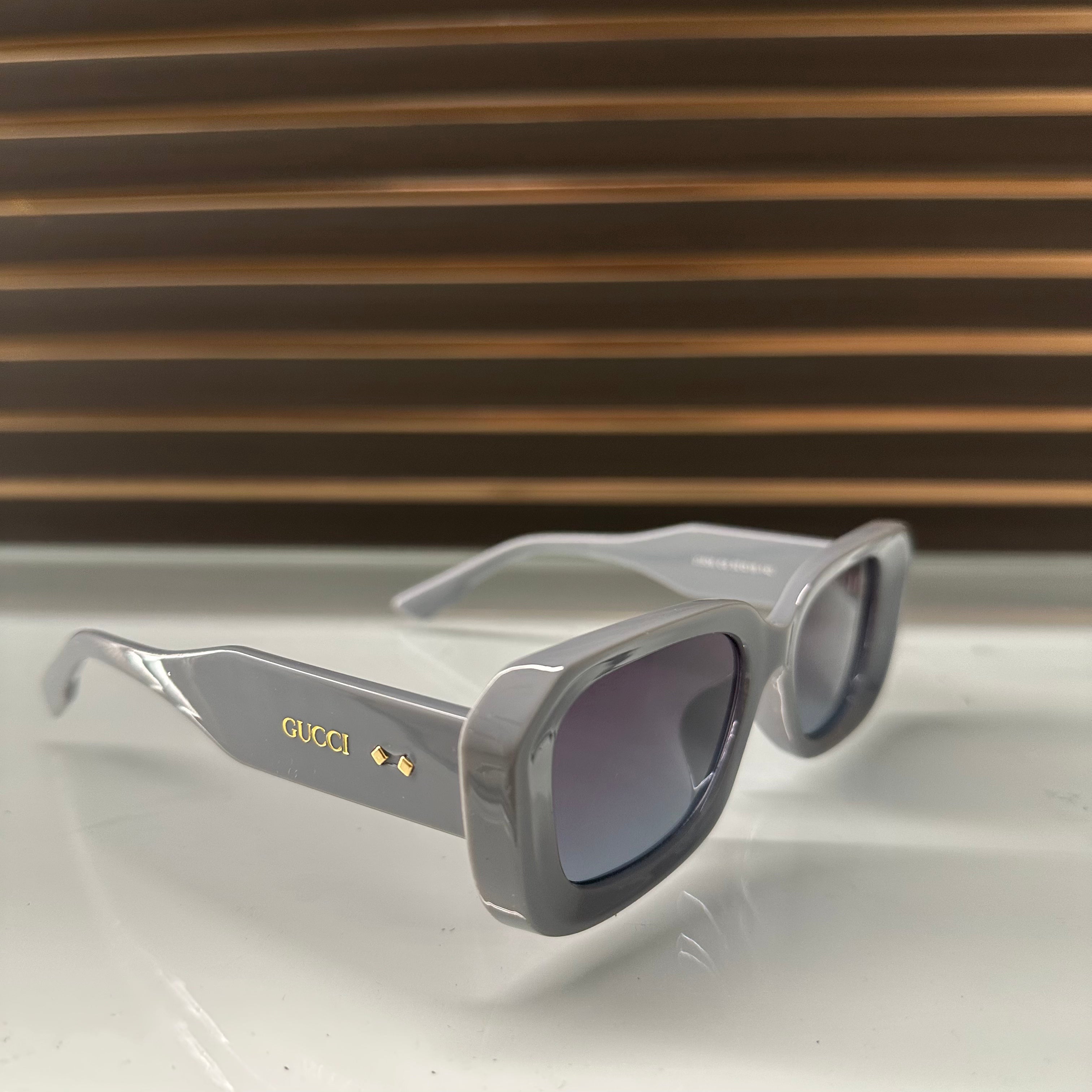 Gucci 23536 Cat-Eye Sunglasses – Shiny Black, Turquish Blue & Tie-Dye Brown